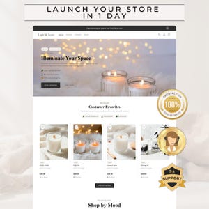 May include: A website mockup for Light & Scent, displaying candles and the text "Launch Your Store In 1 Day." The site includes a banner with candles, and sections for customer favourites and shop by mood. A gold badge reads "Satisfaction 100% Guaranteed."