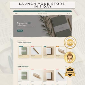 Könnte beinhalten: Ein Website-Template-Design mit dem Titel Launch Your Store In 1 Day, das einen Hero-Bereich mit dem Text The autumn ink collection, ein Produktraster mit Notizbüchern, Stiften und Etuis sowie drei goldene runde Abzeichen für Zufriedenheit und Support enthält.