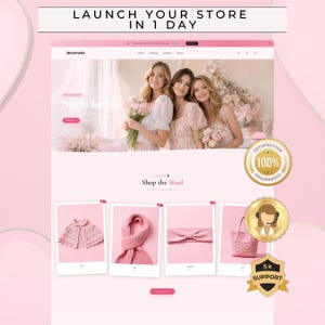 May include: A pink website design with the text "LAUNCH YOUR STORE IN 1 DAY" at the top. The website showcases images of women and pink clothing items, including a cape, scarf, and headband. There is also a "100% Satisfaction Guaranteed" badge.