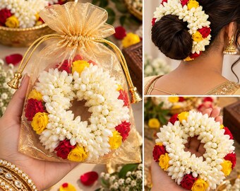 May include: A circular floral hair accessory featuring white jasmine buds interspersed with small red and yellow roses. The accessory is presented inside a sheer gold drawstring organza pouch and is also shown worn as a hair bun wrap.