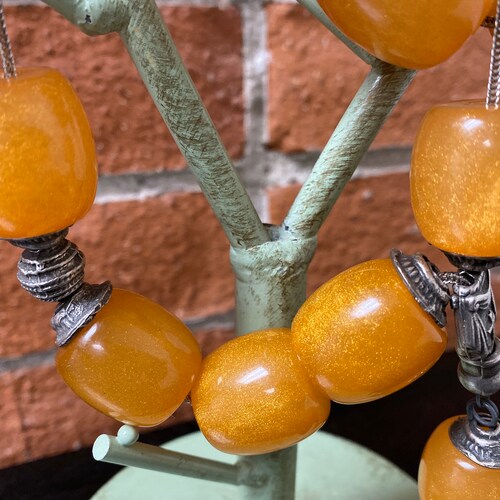 Milagros Christian Rosary prayerbeads with silk tassel amber resin beads shops and silver headwear