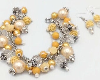 Spring opulence floral cha cha bracelet and earrings in cream, buttery yellow and faceted clear, adjustable, faux pearl cluster bracelet