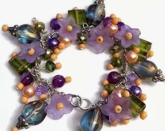 Spring bracelet in green and purple with peach accents and lavender flowers, cha cha bracelet, spring floral jewelry