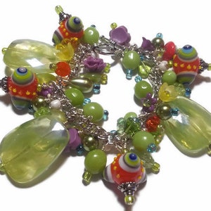 Beaded charm bracelet in lime green, orange, purple and yellow, chunky charm bracelet, cluster bracelet in bright colors, bead charms,