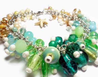 Sea theme beaded charm bracelet with blue and green beads and starfish charm, nautical cha cha bracelet