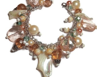 Cha cha bracelet in peach, cream and sage green, beaded charm cluster bracelet with lobster claw clasp