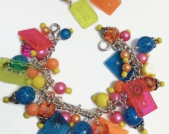 80's cassette bracelet and earring set with cassette tape charms. cha cha bracelet, neon florescent colors, hot pink, blue, orange, yellow,