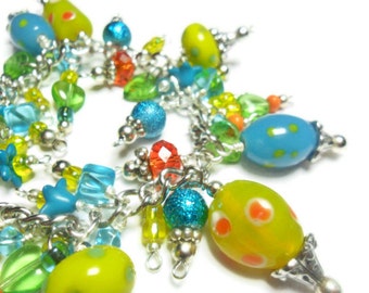 Yellow and blue cluster bracelet in bright colors with adjustable clasp