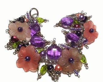 Purple and pink floral beaded charm bracelet with green and orange, toggle clasp, chunky flower bracelet, cha cha bracelet, pink flowers