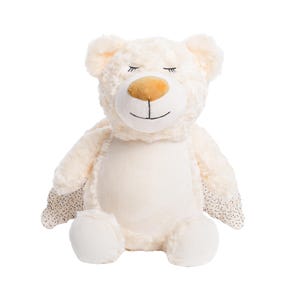 A white stuffed teddy bear with a smiling expression and wings on its back.