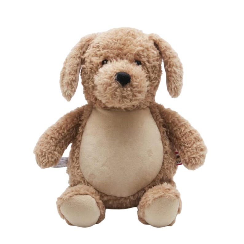 A brown stuffed dog toy with floppy ears and a black nose sits on a white background.