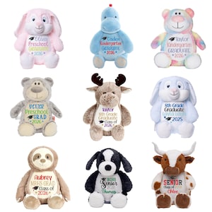 a collection of stuffed animals, each with a personalized graduation-related message.
