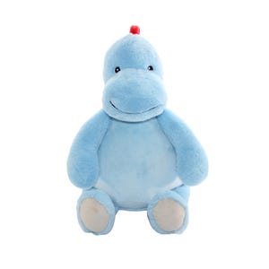 A light blue stuffed animal toy with a red flower on its head is sitting on a white background.