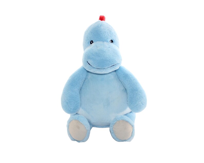 A light blue stuffed animal toy with a red flower on its head is sitting on a white background.