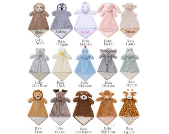 May include: A collection of fifteen plush animal security blankets featuring various characters including a sloth, penguin, unicorn, bunny, lamb, bear, duck, dinosaur, elephant, alligator, lion, moose, cockapoo, cow, and giraffe with embroidered names.