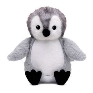 A stuffed penguin toy with a gray and white body and black feet is sitting on a white background.