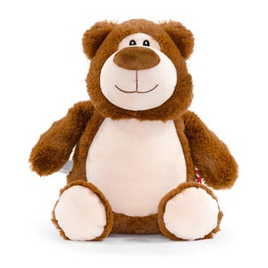 A brown teddy bear sitting on a white background.
