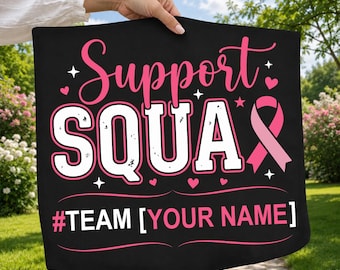 May include: A black square fabric banner featuring the pink text Support SQUAD with a pink awareness ribbon. The design includes small pink hearts and stars, with the text #TEAM [YOUR NAME] printed in white and pink at the bottom.