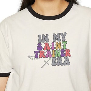 Saint Trainer era shirt, Catholic schoool, Catholic mom gift, Catholic mother shirt, Catholic teacher, Catholic gift for her Catholic woman