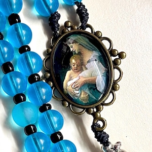 Handmade Rosary Mary and Jesus Bronze centerpiece Blue Glass beads floral Pater bead Bronze crucifix, Blue rosary, Catholic gift