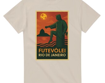May include: Beige t-shirt featuring a graphic of Christ the Redeemer playing soccer on a beach, with a soccer ball in the sky. The text "Futevôlei Rio de Janeiro" is printed below the image.