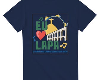 May include: Navy blue t-shirt with a colorful graphic featuring the text "EU LAPA" and a heart, musical notes, and an illustration of the Christ the Redeemer statue and the Arcos da Lapa. The text "O SAMBA MAIS CARIOCA DEBAIXO DOS ARCOS" is also included.
