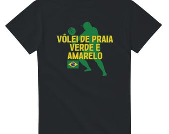 May include: Black t-shirt featuring a green silhouette of a beach volleyball player. The shirt has the text "VÔLEI DE PRAIA VERDE E AMARELO" in yellow and green, along with a Brazilian flag graphic.