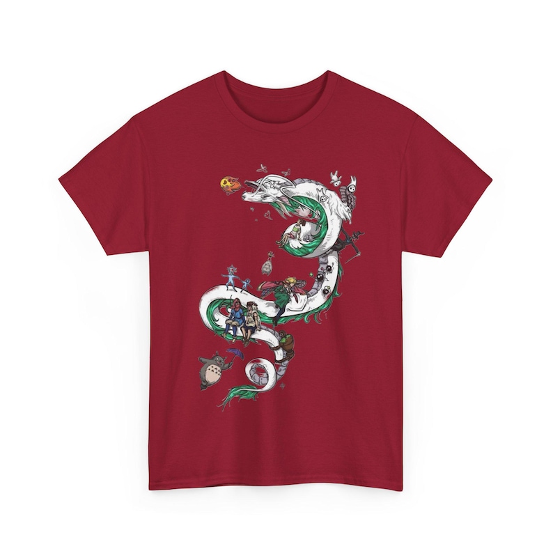May include: Maroon t-shirt featuring a white and green dragon design with various cartoon characters. The dragon winds across the shirt, with characters placed along its body. The design includes a variety of colors.
