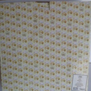 May include: A box with a repeating pattern of cartoon sheep and the text "Country Sweetheart" in a light yellow and beige color scheme. The box has a label in the bottom right corner.
