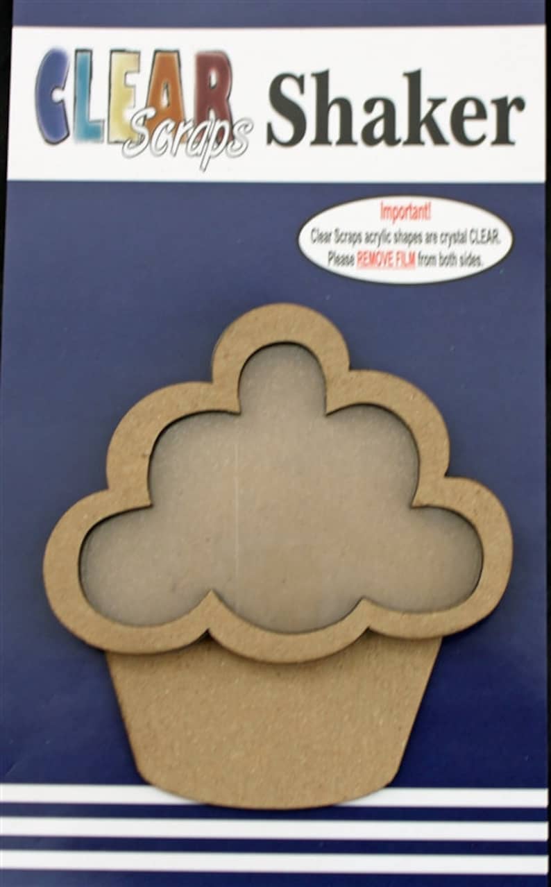May include: A brown wooden cupcake shaker with a clear plastic window. The shaker is on a blue background with white stripes. The text "CLEAR Scraps Shaker" is at the top of the image. The text "Important! Clear Scraps acrylic shapes are crystal CLEAR. Please REMOVE FILM from both sides." is at the bottom of the image.