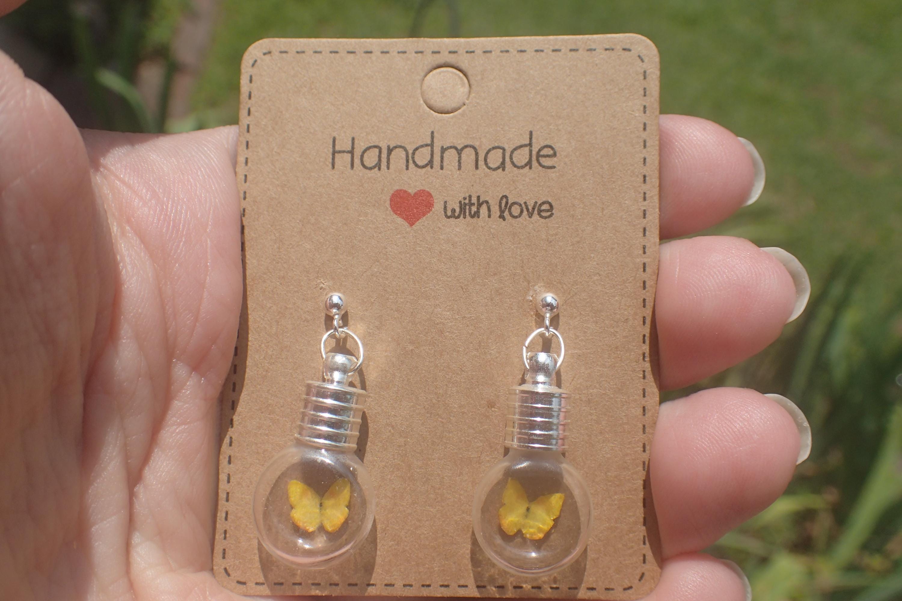 Tiny yellow butterfly earrings. Sterling silver earring posts.