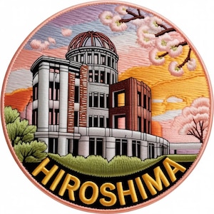 May include: A circular embroidered patch featuring the Hiroshima Peace Memorial with its iconic dome. The design includes pink cherry blossoms, a sunset sky in shades of orange and purple, and green foliage. The word HIROSHIMA is stitched in gold.