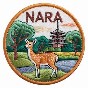 May include: Embroidered patch featuring a deer in a field with a pagoda and trees. The word "NARA" is stitched in brown letters above the scene. The patch has a white background with a brown border.