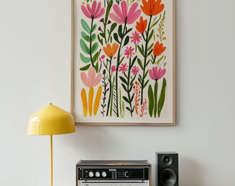 May include: A framed floral art print featuring a colorful array of stylized flowers in pink, orange, and green against a cream background. The artwork is displayed above a vintage stereo system and a yellow floor lamp.