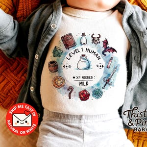 Level 1 Human DND Baby Onesie® – RPG Gamer Baby Bodysuit, Nerdy Newborn Outfit, Dungeon Master Baby Gift, Fantasy Baby Clothes
