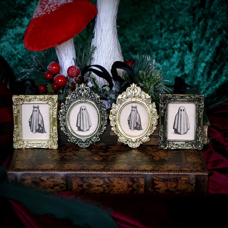 May include: A white ceramic mug with a black handle and the text "But First, Coffee" in a bold, black font. The mug is set against a blurred background, suggesting a cozy setting.