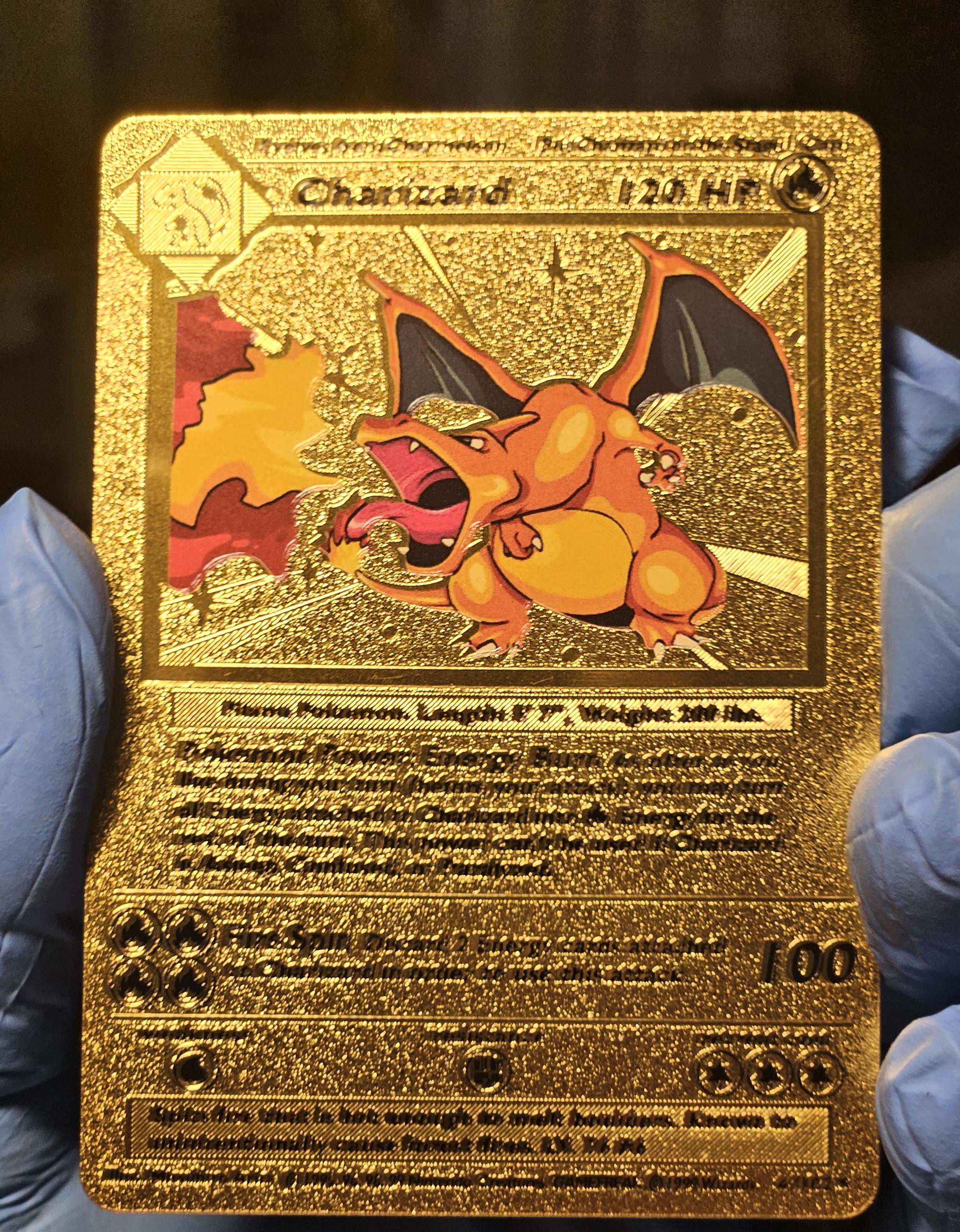 gold charizard card first edition Charizard gold-plated Pokémon First Edition