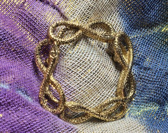 Broche vintage de serpiente entrelazada