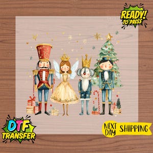May include: A whimsical illustration featuring a nutcracker, fairy, koala, and soldier, with a Christmas tree and gifts. The design includes the text "READY! TO PRESS" and "DTF TRANSFER".