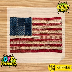 May include: A fabric American flag design with a blue field of stars and red and white stripes. The flag is made of stitched fabric pieces. The image includes the text "READY! TO PRESS" and "DTF TRANSFER".