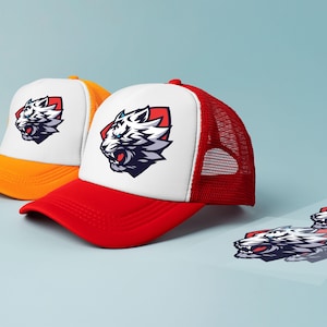 May include: Two trucker hats featuring a tiger logo. One hat is red and white, the other is yellow and white. The tiger logo is white, black, and red, set against a red background. The hats have a mesh back.