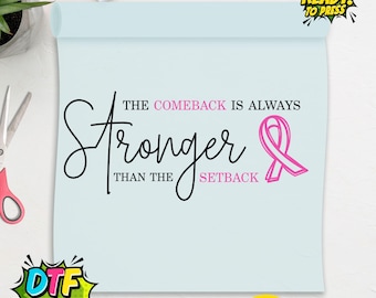May include: A light blue DTF transfer sheet with the text "The Comeback Is Always Stronger Than The Setback" in black script. A pink ribbon graphic is on the right. The words "READY! TO PRESS" and "DTF TRANSFER" are also visible.