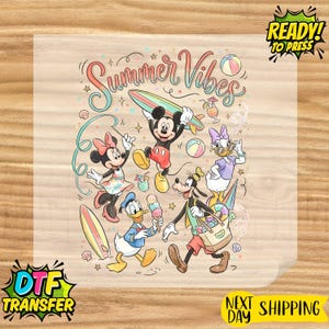May include: A DTF transfer sheet featuring a colorful cartoon illustration with the text Summer Vibes. Mickey Mouse holds a surfboard, Minnie Mouse dances, Donald Duck holds an ice cream cone, and Goofy carries a beach bag with Daisy Duck nearby.