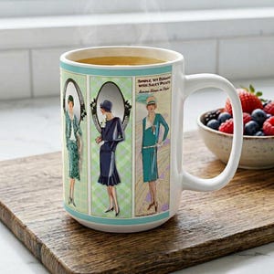 May include: A white ceramic mug featuring three vertical panels with vintage-style illustrations of figures in 1920s fashion. The right panel includes the text "SIMPLE, YET ELEGANT WITH SAUCY PLEATS" and "Serious Sleepe in Style" in black lettering.