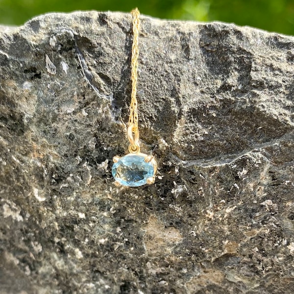 Aquamarine solid 14kt gold solitaire dainty tiny blue gemstone delicate east west oval necklace or a charm