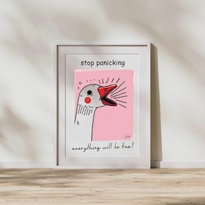 May include: Framed art print with a cartoon goose illustration. The goose has a red beak and is set against a pink background. The text "stop panicking" and "everything will be fine!" are in black. The artwork is in a white frame.