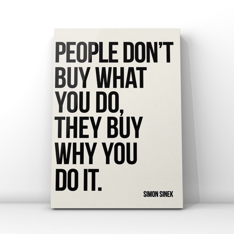 May include: Black and white motivational quote on a beige background. The quote reads "People don't buy what you do, they buy why you do it." The quote is attributed to Simon Sinek.