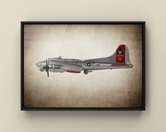 May include: A framed print of a silver B-17 bomber airplane. The plane has red accents on the wings and tail, with the letters "W" and "H" and the numbers "2102516" on the tail. The print is set against a sepia-toned background.