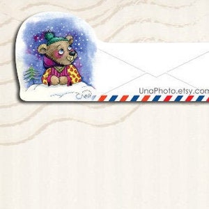 May include: A cream-colored postcard with a whimsical illustration of a bear wearing a hat and scarf in a snowy scene. The postcard includes a stylized envelope, the word "thanks", and a postage stamp with a bicycle.