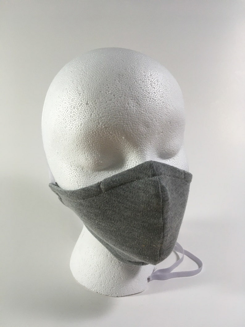 Grey face mask with adjustable straps image 0